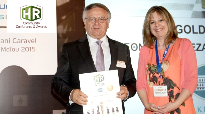 Representatives of NBG S.A. holding an award