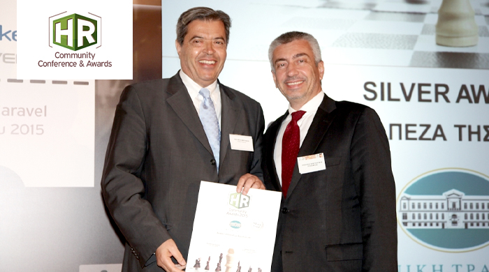 Representatives of NBG S.A. holding an award
