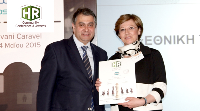 Representatives of NBG S.A. holding an award