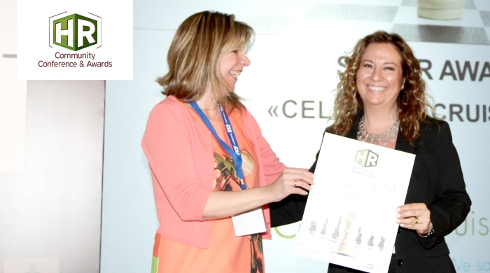 Representatives of Celestial Cruises S.A. holding an award