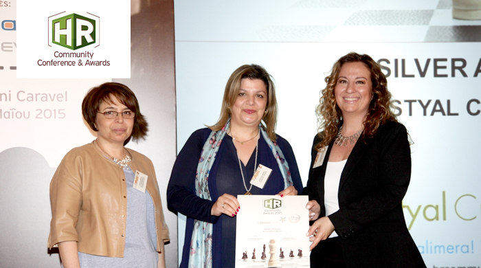 Representatives of Celestial Cruises S.A. holding an award