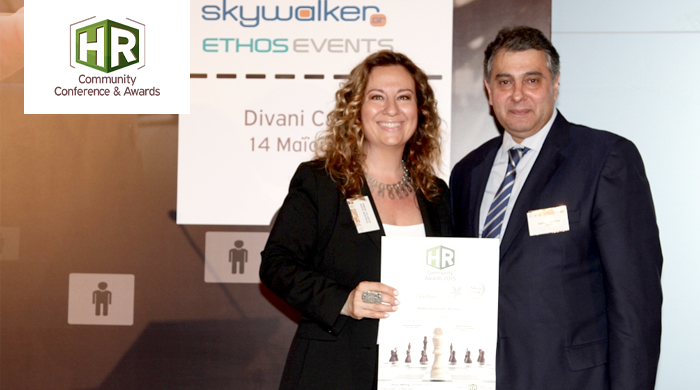 Representatives of Celestial Cruises S.A. holding an award