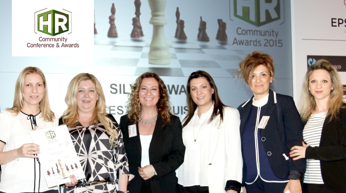 Representatives of Celestial Cruises S.A. holding an award