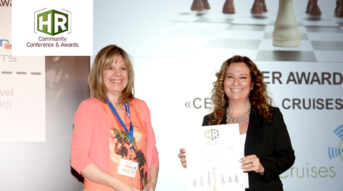 Representatives of Celestial Cruises S.A. holding an award